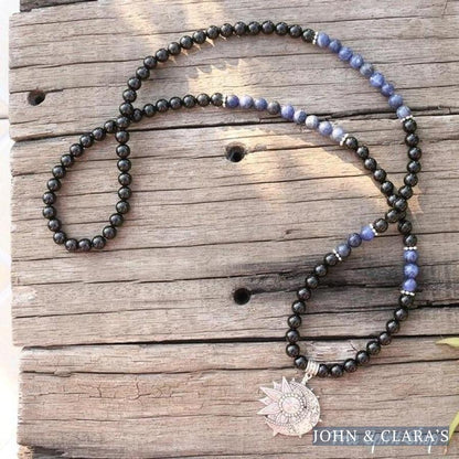 108 Natural Black Onyx & Sodalite Mala Beads With Sun & Moon Pendant